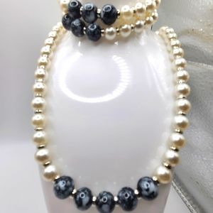 Jewelry set. Necklace and two bracelets